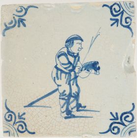 Antique Delft tile with a hobby horse, 17th century