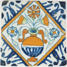 Antique Delft tile with a flower vase, 17th century