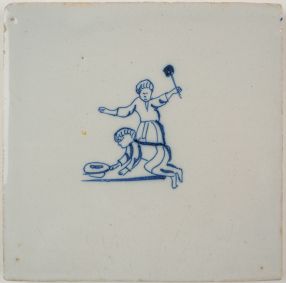 Antique Delft tile with a game of Tip-Cat, 18th century
