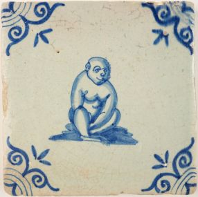 Antique Delft tile with an ape, 17th century