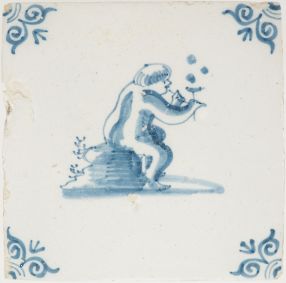 Antique Delft tile with Cupid blowing bubbles, 17th century
