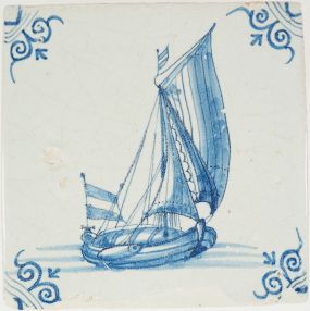 Antique Delft tile with a cargoboat under sail, 17th century