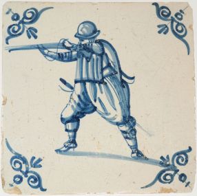 Antique Delft tile with a musketeer, 17th century