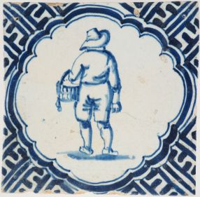 Antique Delft tile with a man going homewards, 17th century