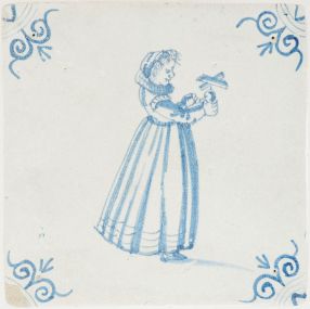 Antique Delft tile in blue with a girl playing with a miniature windmill, 17th century