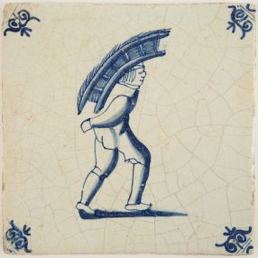 Delft tile depicting a man carrying goods on his back