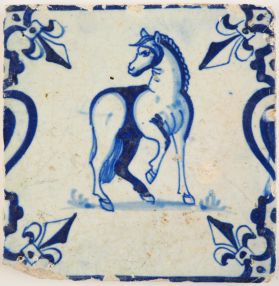 Antique Delft tile with a good looking horse