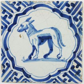 Antique Dutch Delft tile in blue with a dog wearing a collar, 17th century