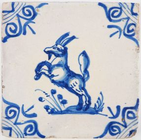 Antique Delft tile with a beautiful and fierce looking capricorn in blue, 17th century