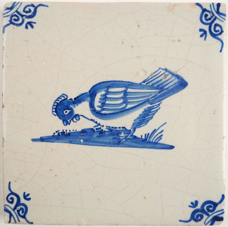 Antique Delft tile with a chicken, 17th century